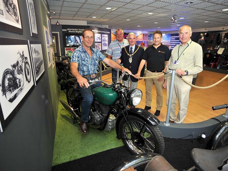 Family member John Smith visits the shop with Coun. Gareth Prosser, Mayor Roger Bennett, Mark Spiller (Marketing Manager Europe) and Coun. Julian Grubb. (courtesy of Redditch Standard)