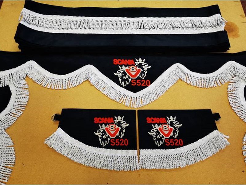 finished pair of black and white with embroidery curtains made by caroline