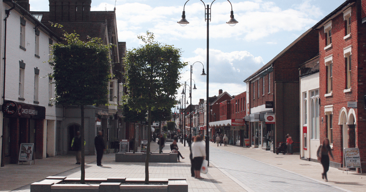 Image shows high street with buildings and shops